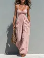 Mono rosa chic sin mangas para vacaciones con cuello en V y bolsillos en modelo - Rosa