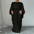 Elegant black two-piece set featuring a batwing sleeve top and a long pleated maxi skirt. - S / Top And Bottom / Black