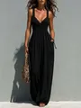 Detalle de vestido largo negro con cuello en V, encaje y bolsillos laterales. - S / Conjuntos / Negro