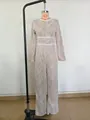 Vue de face d'une élégante combinaison en dentelle blanche sur mannequin pour la fête - S / Haut Et Bas / Sans Ceinture / Blanc