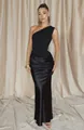 Elegant black one-shoulder pleated satin maxi dress worn by a model in front of curtains. - XS / Dresses / Black