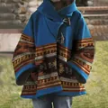 Détail de l'imprimé ethnique vintage et du bouton brandebourg sur un manteau en laine - S / Hauts / Bleu Marron