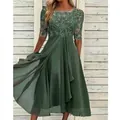 Elegante abito da sera verde scuro con corpetto in pizzo e dettaglio gonna in chiffon - Taglia S / Vestiti / Verde