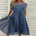 Elegant blue evening dress featuring a lace bodice and a flowing chiffon skirt detail - S / Dresses / Navy Blue