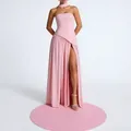 Elegant pink strapless evening gown with a high slit and matching neck scarf detail. - Pink
