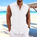 Detail of men's white sleeveless cotton linen shirt with lapel on a tropical beach - S / Tops / White