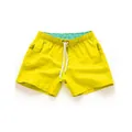 Vibrant yellow men's beach shorts with drawstring waist and quick-dry fabric - S / Bottoms / Yellow