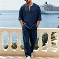 Κομψό μοντέλο που φοράει μπλε λινό καλοκαιρινό σετ σε ηλιόλουστο μπαλκόνι στη θάλασσα - S / Τοπ Και Παντελόνι / Ναυτικό μπλε