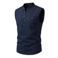Detailed close-up view of a navy blue linen sleeveless Henley shirt with buttoned chest pocket - Navy Blue