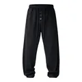 Men's waffle knit loose casual pants with adjustable drawstring waist in solid black - S / Bottoms / Black