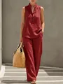Detailed view of women's red sleeveless mandarin collar top and wide leg pants set - Red