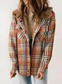 Detailed shot of women's orange plaid hooded jacket featuring a warm brown fleece lining - Orange