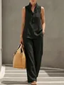 Detail view of women's sleeveless stand collar top and wide leg pants linen-style set - Black