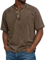 Macro view of vintage washed brown cotton henley shirt with three-button placket - Brown