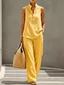 Two-piece yellow linen set featuring sleeveless button top and wide-leg trousers - S / Top And Bottom / Yellow