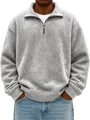 Close-up detail of men's grey half-zip sweatshirt with distressed texture and collar - Light Gray