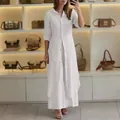 Elegant white linen two-piece set for women featuring long sleeve tunic and wide-leg pants - S / Top And Bottom / White