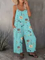 Stylish light blue floral print sleeveless jumpsuit with wide legs and side pockets - S / Dresses / Emerald
