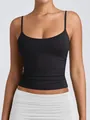 Close-up detail of a black women's camisole featuring adjustable thin spaghetti straps. - XS / Tops / Black