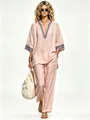 Full detail view of pink bohemian linen two-piece set featuring elegant V-neck embroidery - Pink