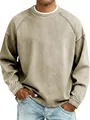 Close-up detail of men's vintage distressed beige crewneck oversized casual sweatshirt - S / Tops / Apricot