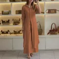 Elegant terracotta linen two-piece set featuring long tunic and wide-leg trousers for women - Caramel color