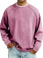 Macro view of men's vintage washed crew neck sweatshirt in casual dusty rose finish - Pink