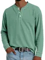 Detailed view of men's green long-sleeved ribbed Henley shirt with three white buttons - Light Green