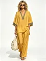 Elegant Bohemian yellow linen V-neck two-piece set featuring geometric embroidery detail - Yellow