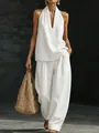 Vue complète d'un ensemble haut dos nu en denim blanc et pantalon large avec sac tressé - S / Haut et Bas / Blanc