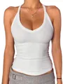 Close-up detail of white rib-knit V-neck tank top showing texture and comfortable slim fit - XS / Tops / White