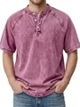 Detailed macro view of acid wash texture and button placket on men's vintage pink Henley t-shirt - 4XL / Tops / Pink
