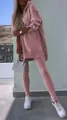 Detailed view of pink two-piece workout set with side-slit hoodie and leggings - S / Pink