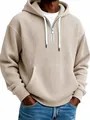 Détail d'un sweat à capuche en velours côtelé beige pour homme montrant la texture côtelée. - Kaki