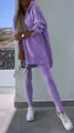 Full body view of a women's purple hooded sweatshirt and matching leggings two-piece set - Purple