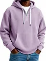 Détail du sweat à capuche en velours côtelé lavande avec demi-zip et poche kangourou. - Violet