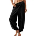 Detail showing the loose fit and soft texture of black casual harem pants - Black