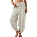 Women's white loose casual harem pants featuring an elastic waist and side pockets - XS / Bottoms / White