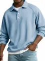 Close-up of men's blue waffle knit long sleeve Polo shirt with raglan sleeves - Sky Blue