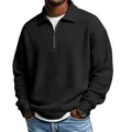 Detail view of men's black waffle knit polo shirt with quarter-zip and lapel collar - S / Tops / Black