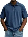 Detailansicht eines Herren Vintage Acid Wash Polo-Shirts mit Kurzarm und Used-Look - Dunkelblau