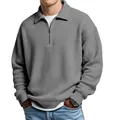 Close-up detail of a grey waffle-knit polo shirt showing the collar and zip-up area - S / Tops / Gray
