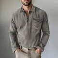 Close-up of men's half-zip denim shirt with lapel collar and utility chest pocket detail. - 3XL / Tops / Gray