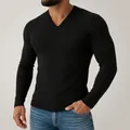 Close-up detail of a men's slim fit V-neck long sleeve ribbed knit T-shirt in black - S / Tops / Black