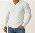Close-up detail of a white ribbed V-neck long sleeve T-shirt for men showing the slim fit - S / Tops / White