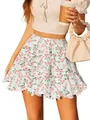 Close-up showing the ruffled hem and pink floral print on this high-waisted mini skirt - S / Bottoms / White Floral