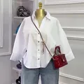 Stylish women's loose white button-down shirt with elegant lapel collar design for summer. - S / Tops / White