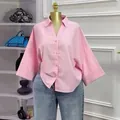 Stylish pink loose short-sleeve button-down shirt with V-neck for women summer fashion. - S / Tops / Pink