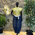 Yellow striped short-sleeve shirt featuring beading and ruffle hem design for women - S / Tops / Yellow