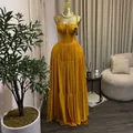 Elegant yellow pleated high waist maxi dress with spaghetti straps for summer occasions. - S / Dresses / Earthy Yellow